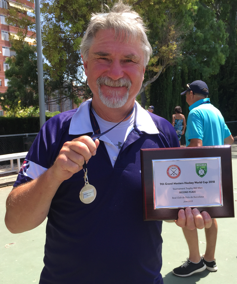 Scottish Thistles Captain Neil Mackenzie with Silver Medal and Tournament Trophy plaque