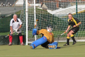 Chris Kalman saves from a Welsh penalty corner